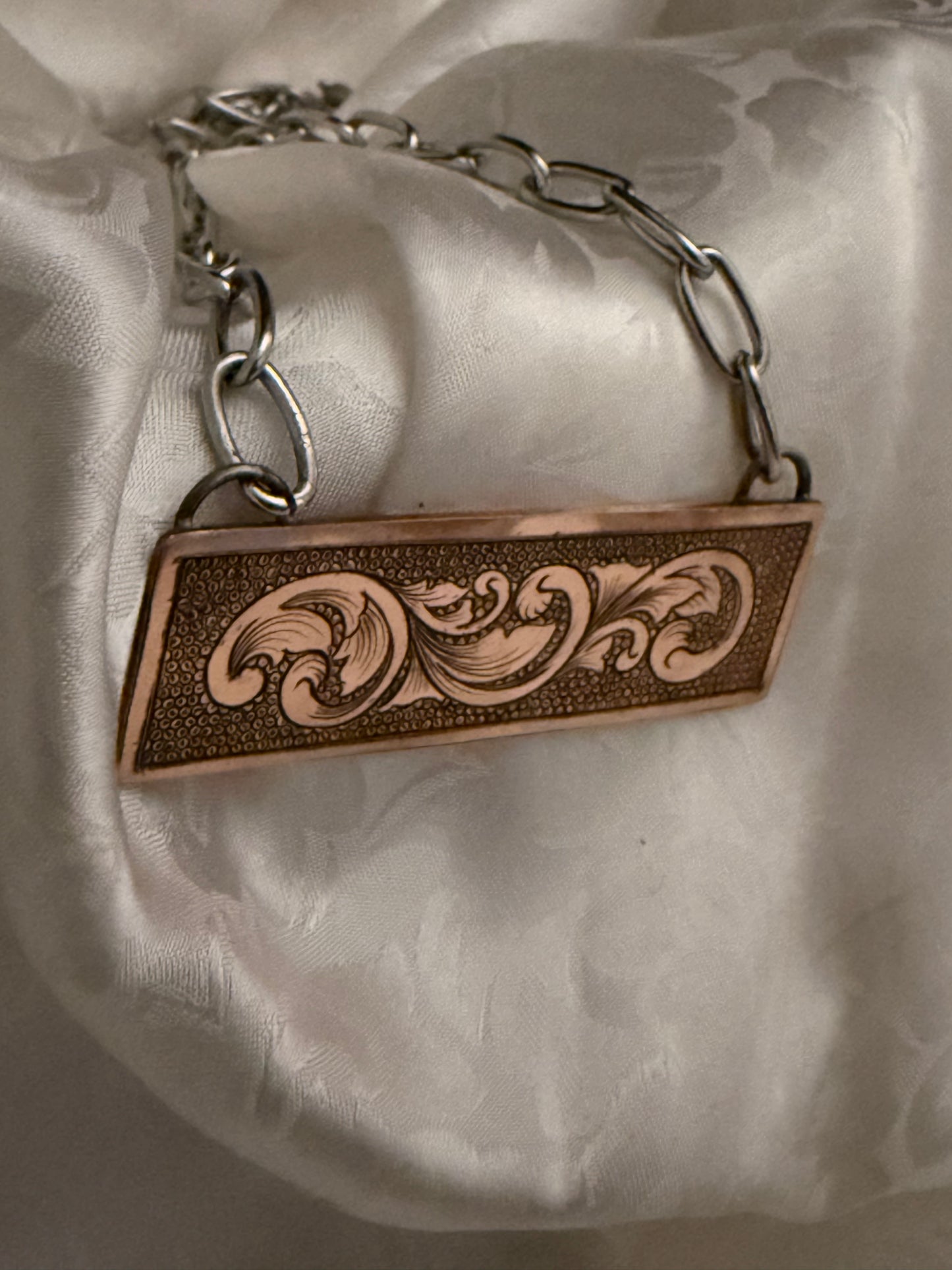 Engraved Copper Bar Necklace with Bead Punch Background